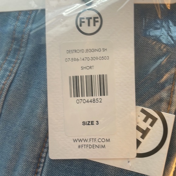 Medium Wash High Rise Destructed Jeggings Short Inseam | Fashion To Figure - Picture 7 of 7